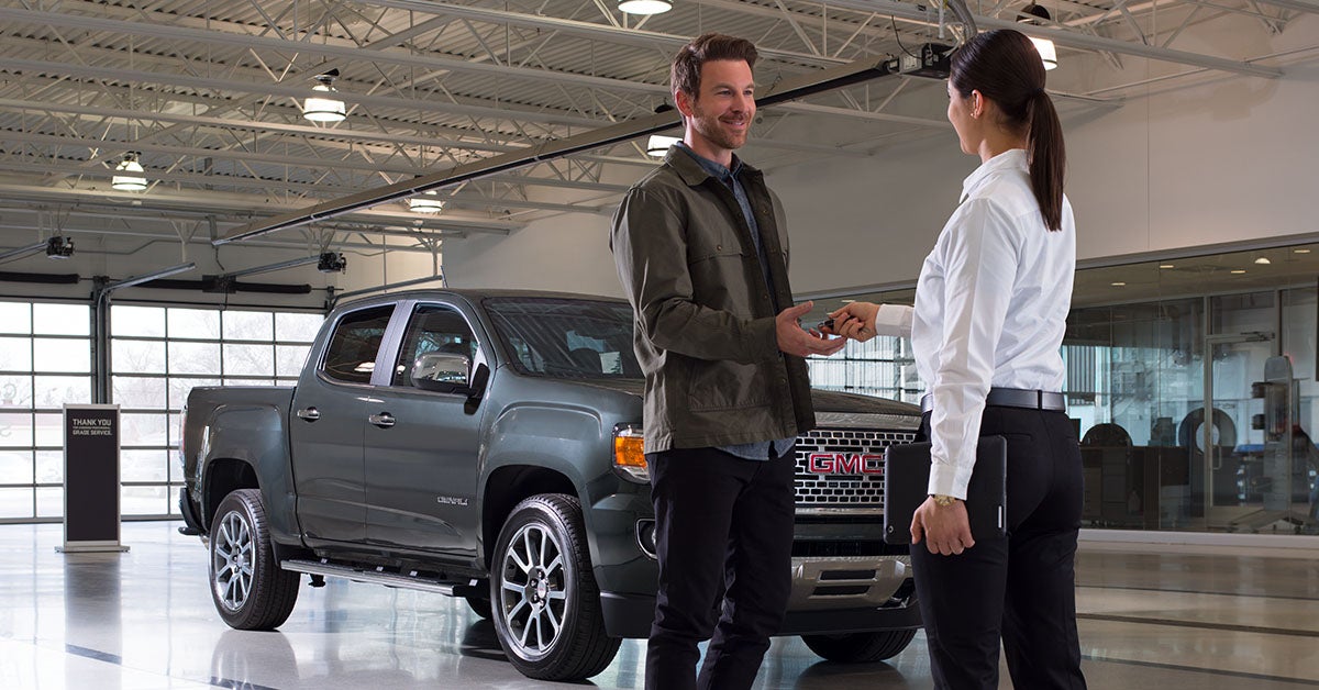 Customer dropping off their GMC truck for a GMC recall service.