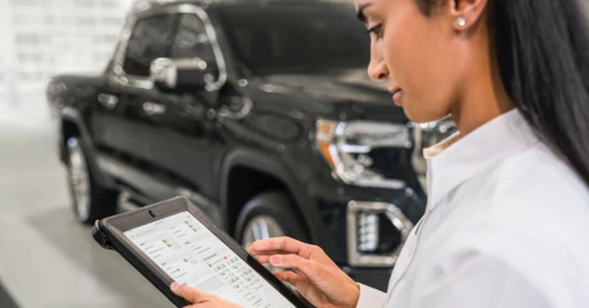 Certified Pre-Owned GMC Truck undergoing rigorous multi-point inspection
